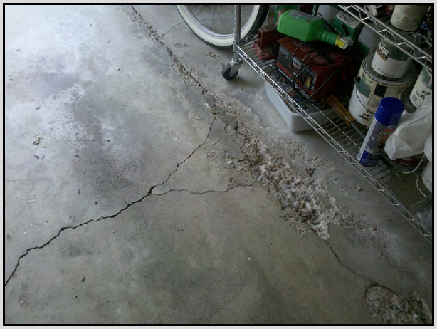 Prepossessing Garage Floor Cracks Before Image