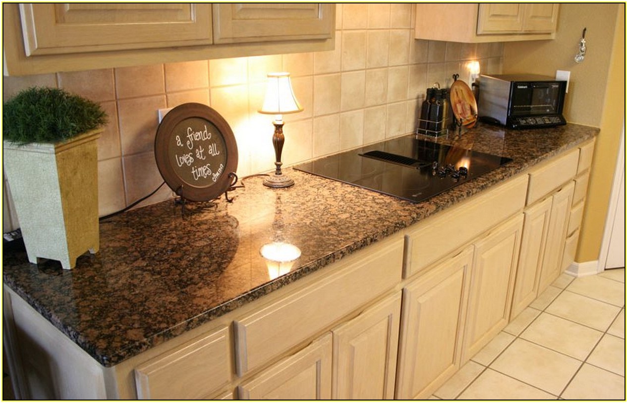 Bainbrook Brown Granite With White Cabinets