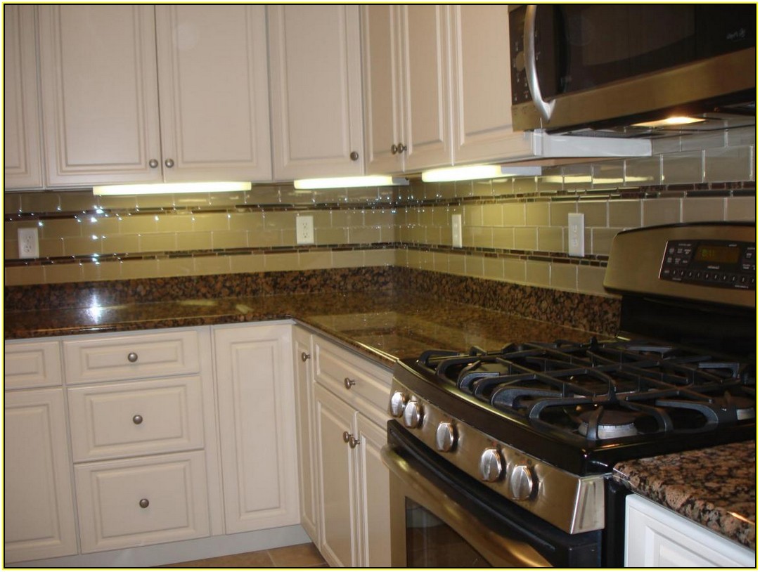 Baltic Brown Granite Countertops With White Cabinets