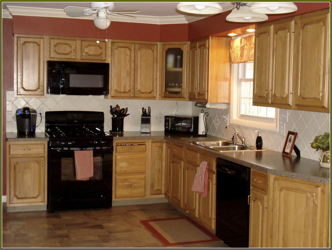 Cherry Kitchen Cabinets With Black Appliances
