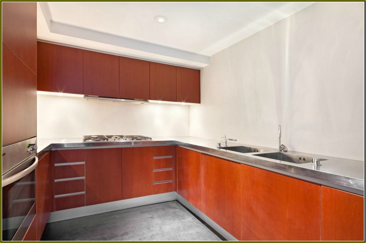 Cherry Kitchen Cabinets With Stainless Steel Appliances