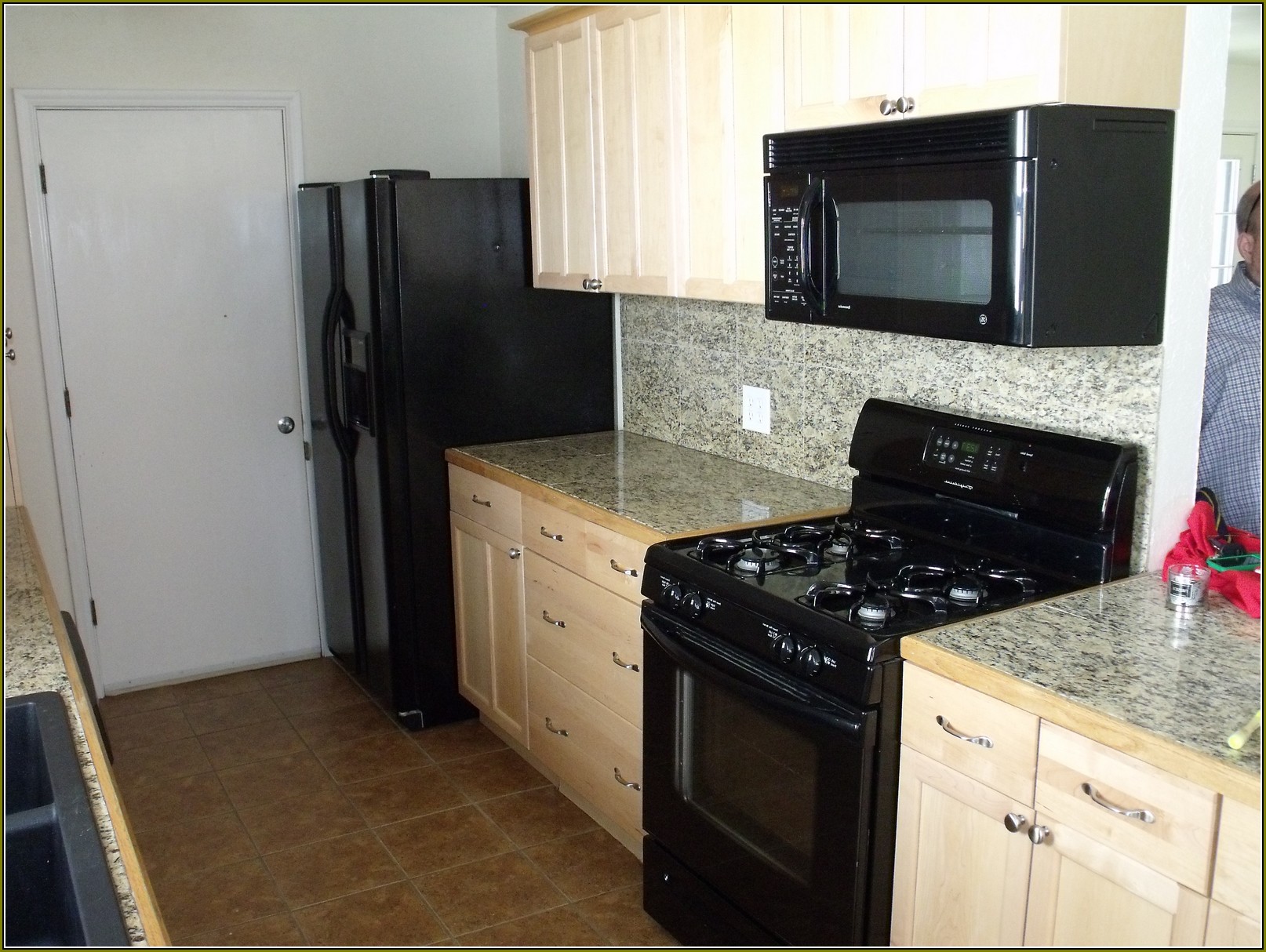 Ivory Kitchen Cabinets With Black Appliances