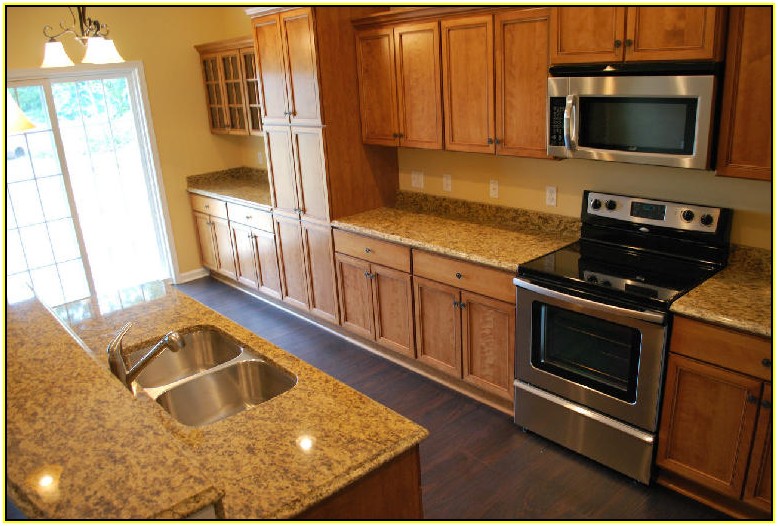 New Venetian Gold Granite With Maple Cabinets